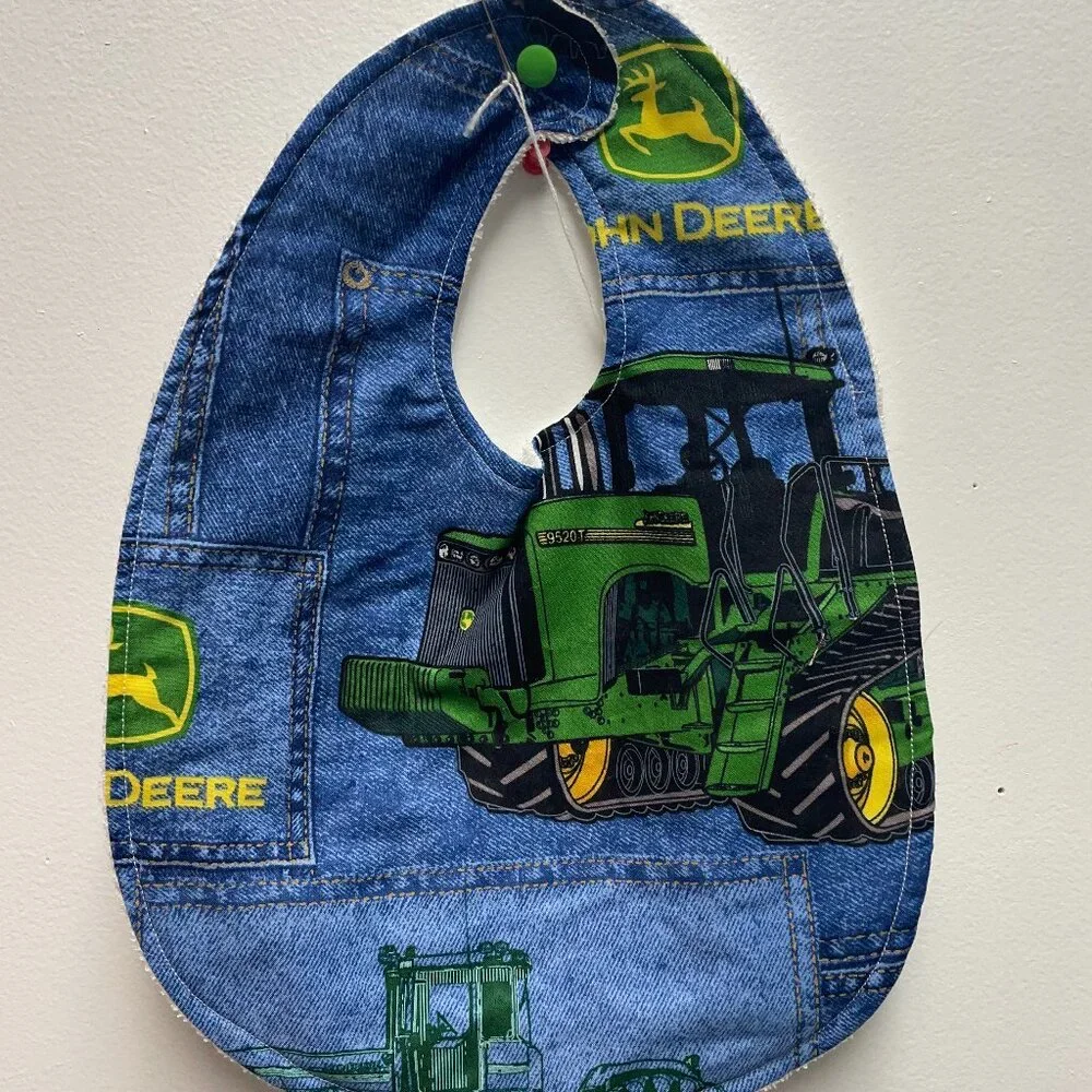 Handmade baby bibb crafted with love. Soft, absorbent cotton bibs.